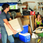 Family clearing out the garage for a yard sale
