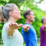 Group of people doing yoga