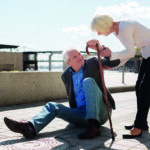 Kind pensioner having pain in his legs